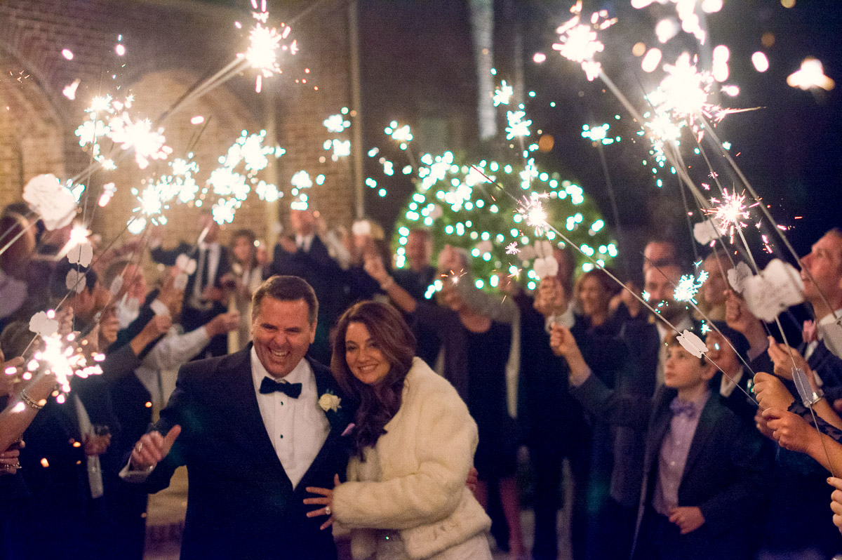 wedding couple running through sparklers held by guests, photography workshops, fisheye connect, moreland photography